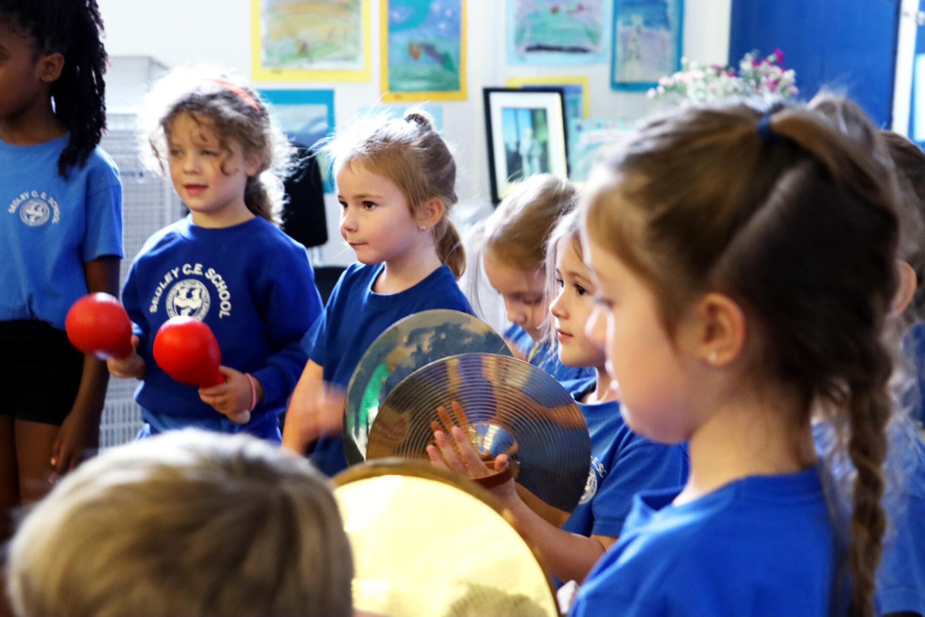 IMG_0357 (1) group of pupils playing with musical instruments, cymbals and maracas