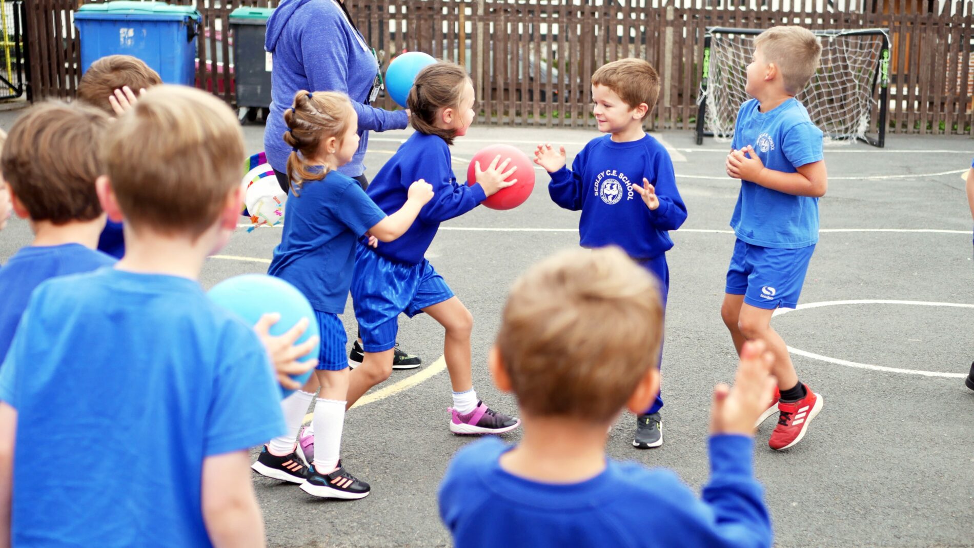 P1160651 sedleys pupils passing a ball along a line