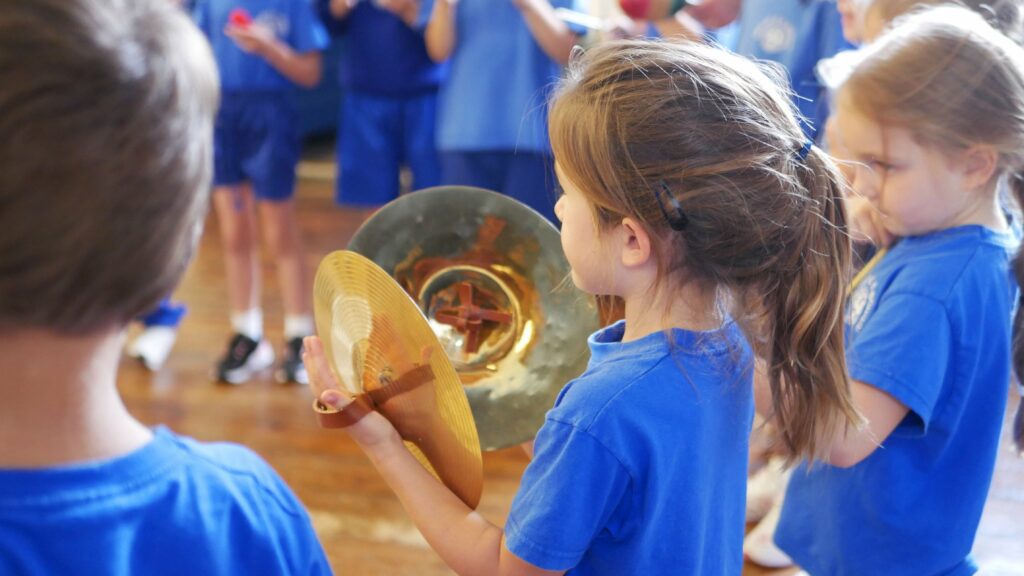 P1160985 pupil playing the cymbals